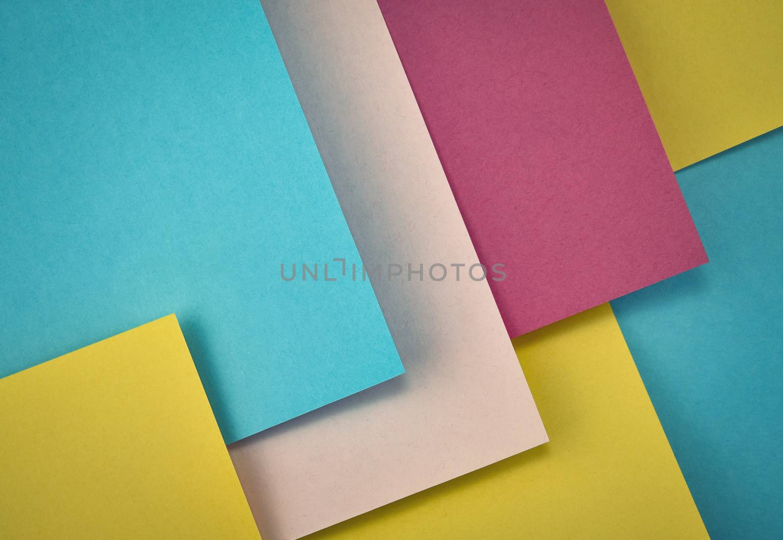 abstract pattern background with colored papers