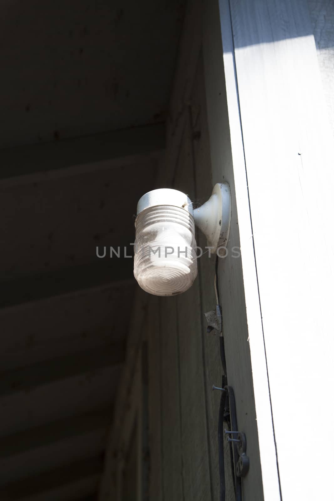 Porch light outside in the daytime