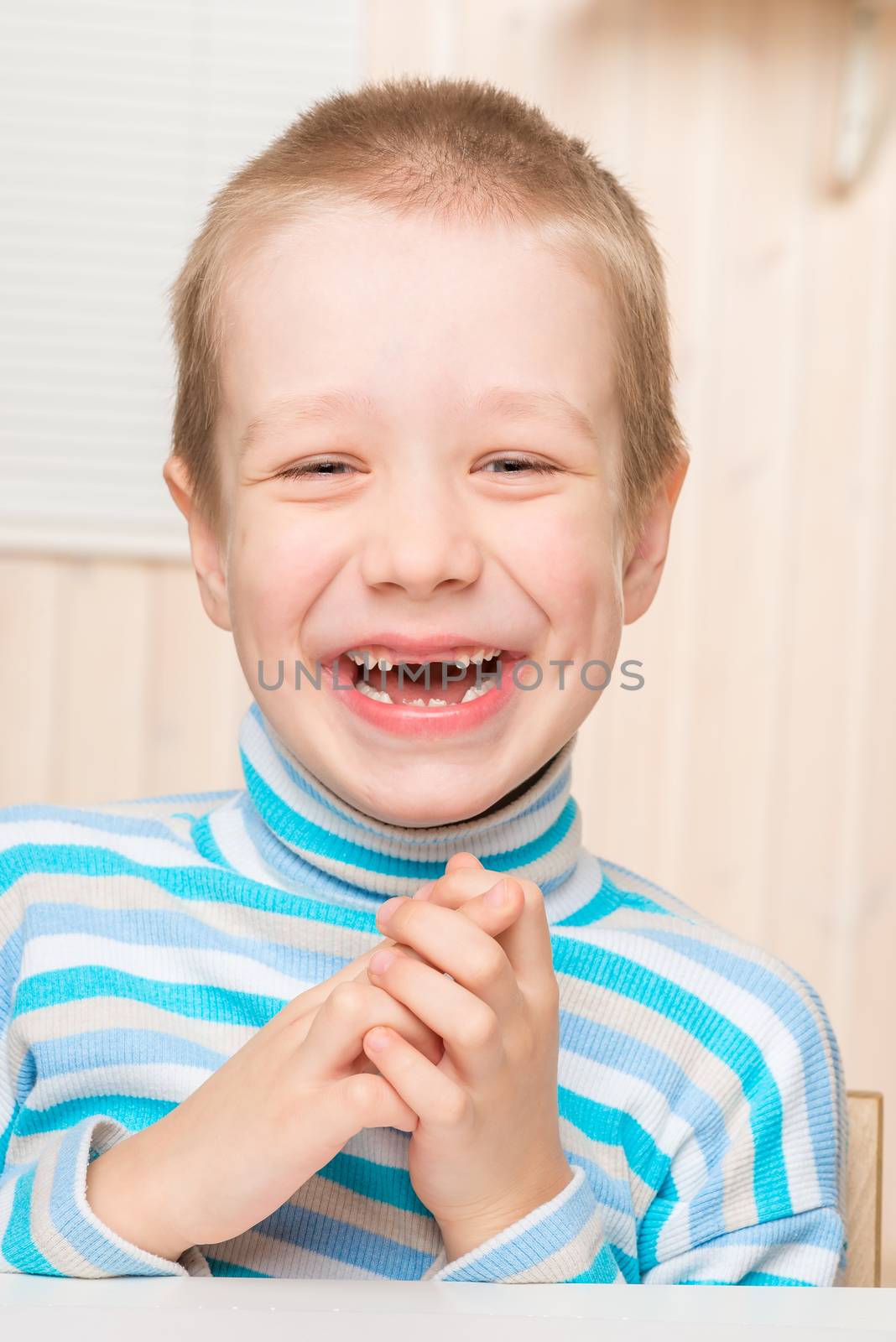 preschooler boy with his front teeth dropped out smiling by kosmsos111