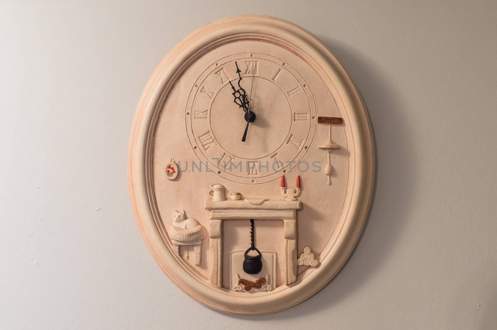 antique earthen clock on wall by okskukuruza