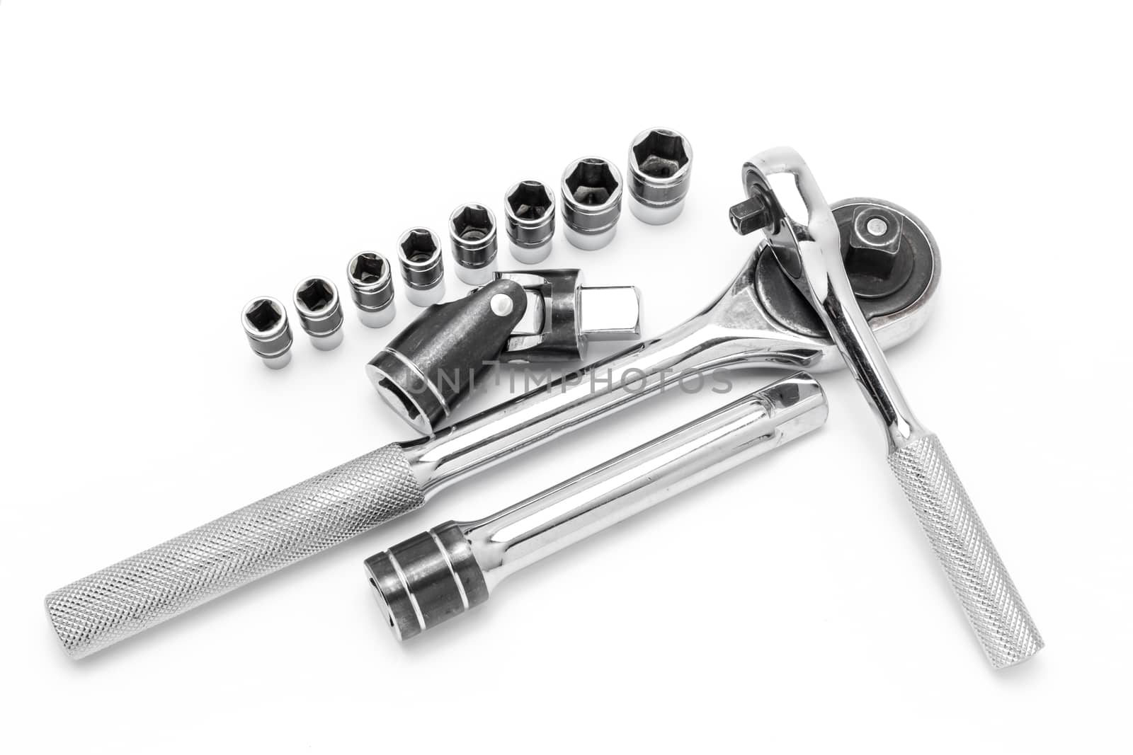 Ratchet spanner and sockets on technical draw background