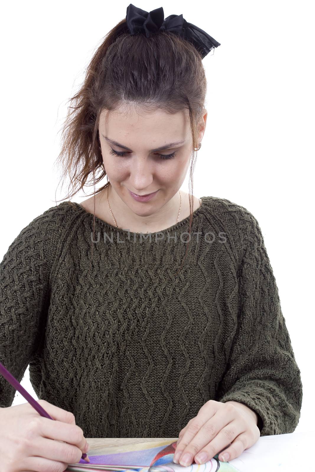 Young girl artist drawing pencils on white background