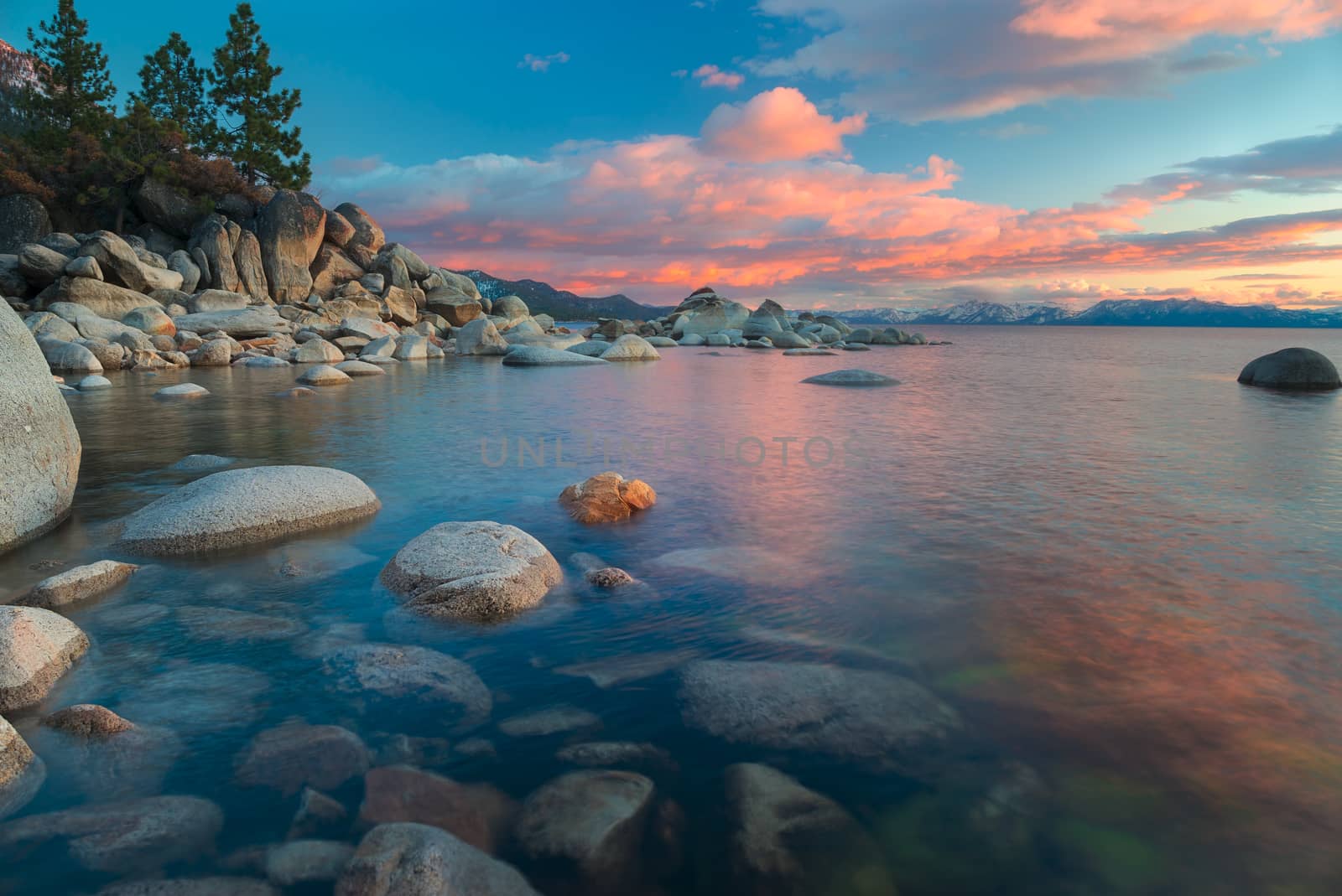 The northern part of Lake Tahoe straddles the border between Calfiornia and Nevada. It's dominant features are big glaciated boulders and clear blue waters.