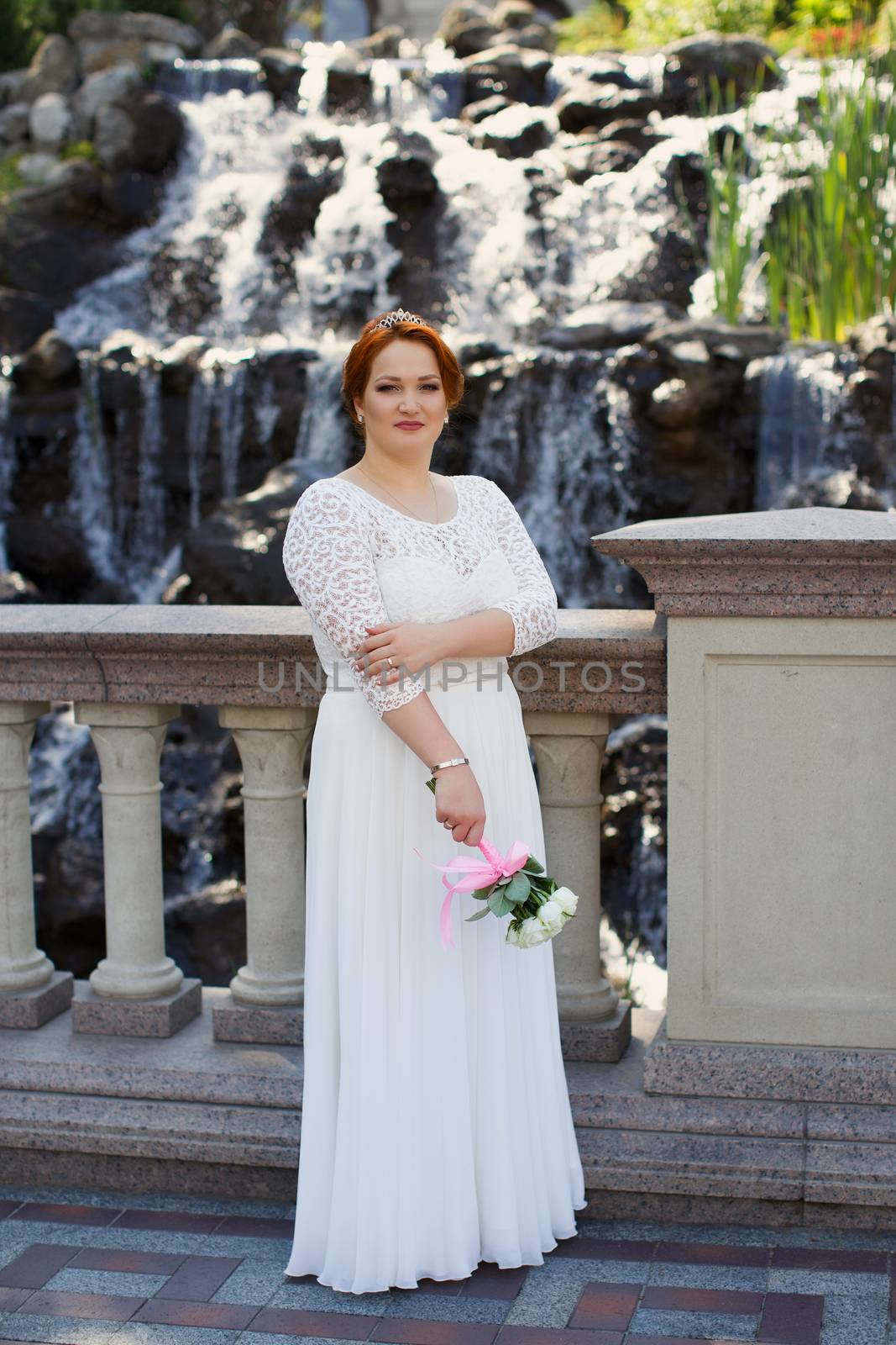 Bride big body on the wedding day for a walk