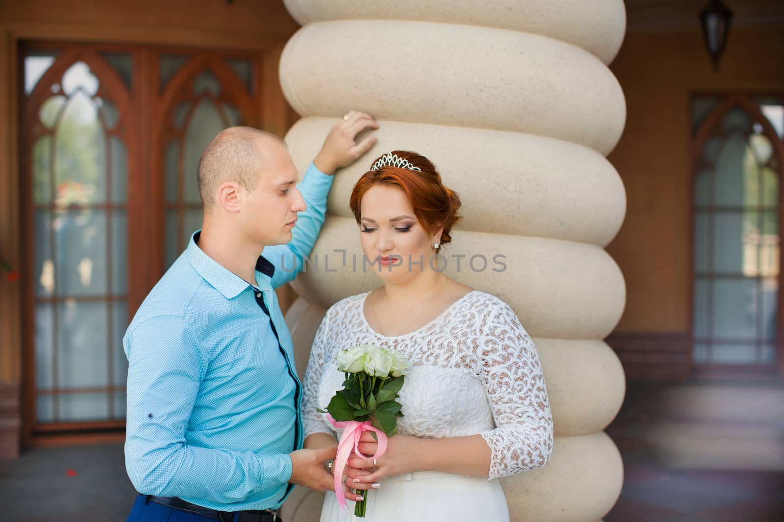 wedding copule. Beautiful bride and groom. Just merried. Close up. Happy bride and groom on their wedding hugging.