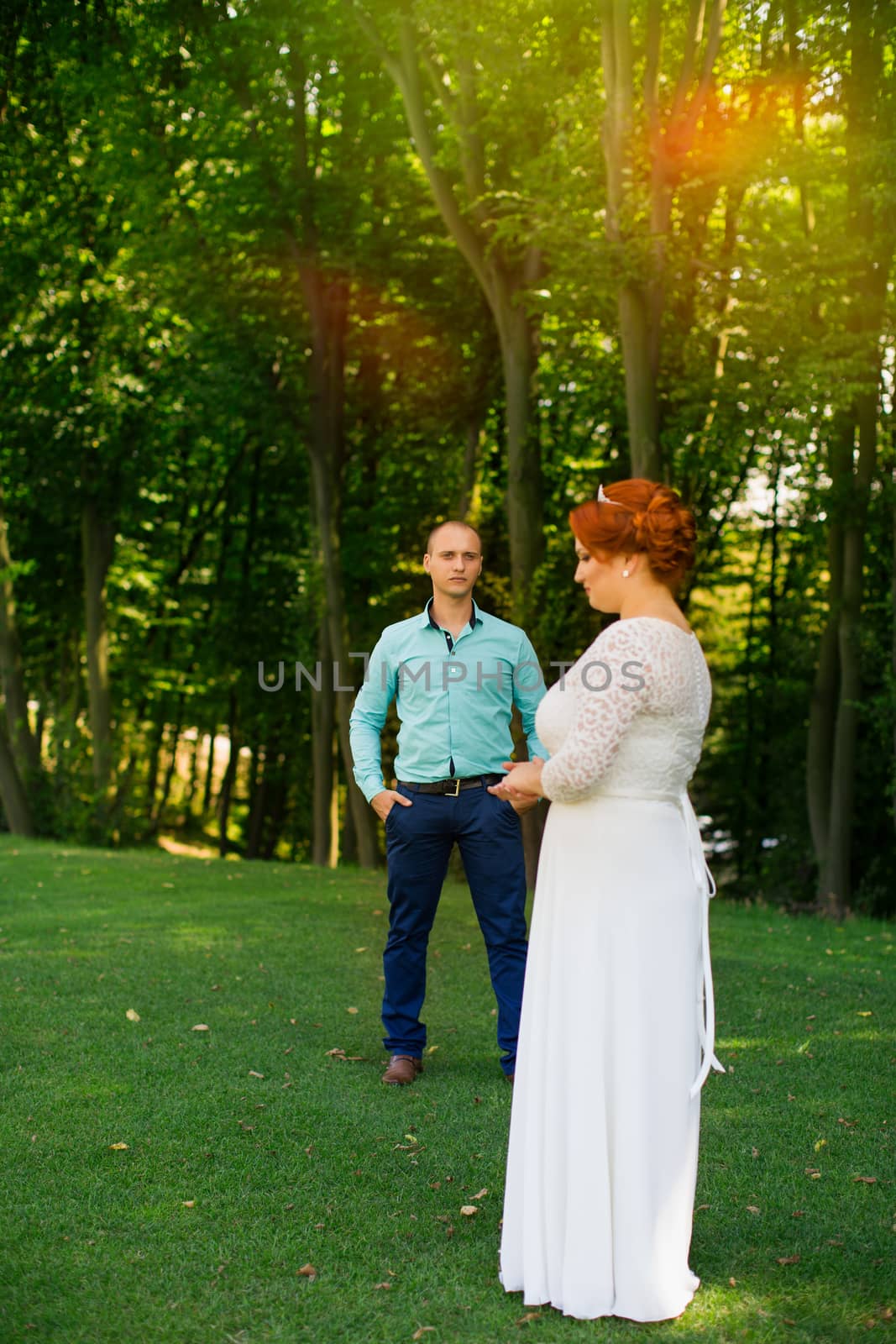 wedding copule. Beautiful bride and groom. Just merried. Close up. Happy bride and groom on their wedding hugging.