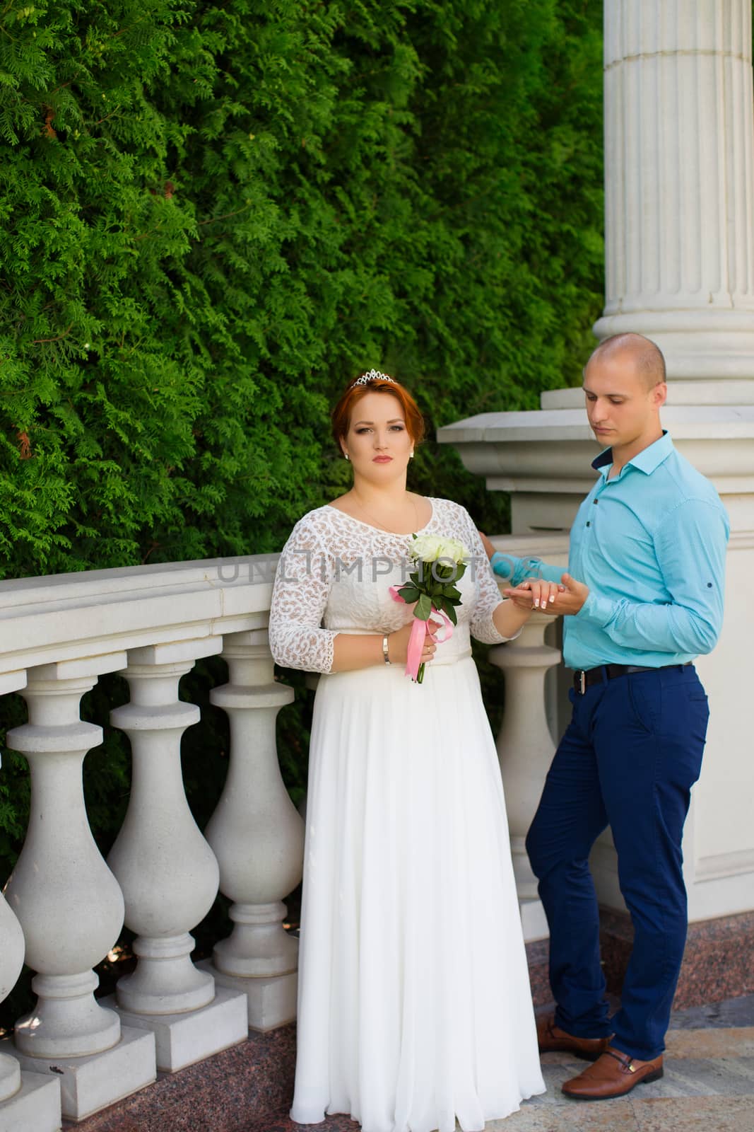 wedding copule. Beautiful bride and groom. Just merried. Close up. Happy bride and groom on their wedding hugging.