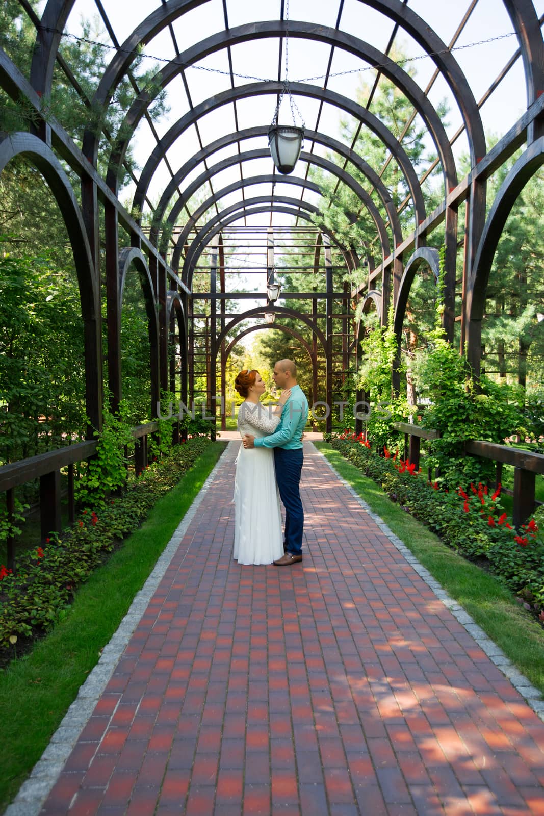 wedding copule. Beautiful bride and groom. Just merried. Close up. Happy bride and groom on their wedding hugging.