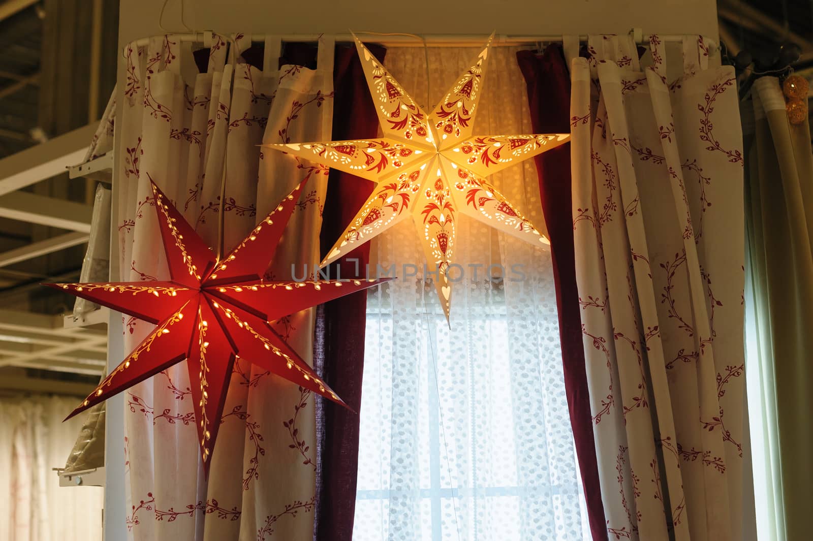 beautiful Christmas decorations glowing star in the bedroom.