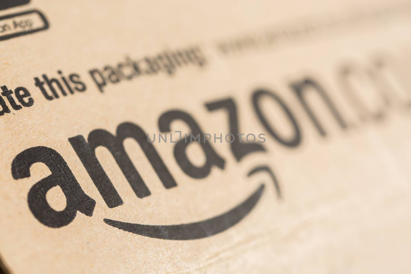 Paris, France - December 15, 2016: Amazon Prime Parcel Package. Amazon, is an American electronic commerce and cloud computing company,based in Seattle, Washington. Started as an online bookstore, Amazon is become the most importrant retailer in the United States by market capitalization