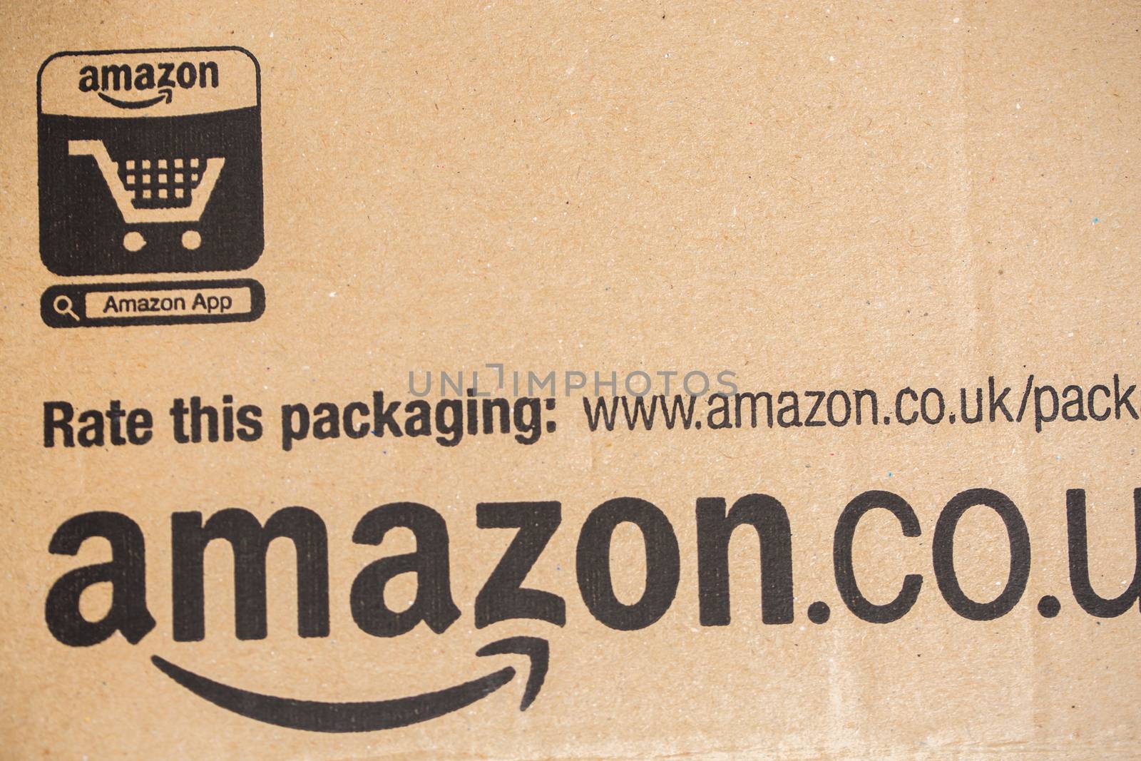 Paris, France - December 15, 2016: Amazon Prime Parcel Package. Amazon, is an American electronic commerce and cloud computing company,based in Seattle, Washington. Started as an online bookstore, Amazon is become the most importrant retailer in the United States by market capitalization