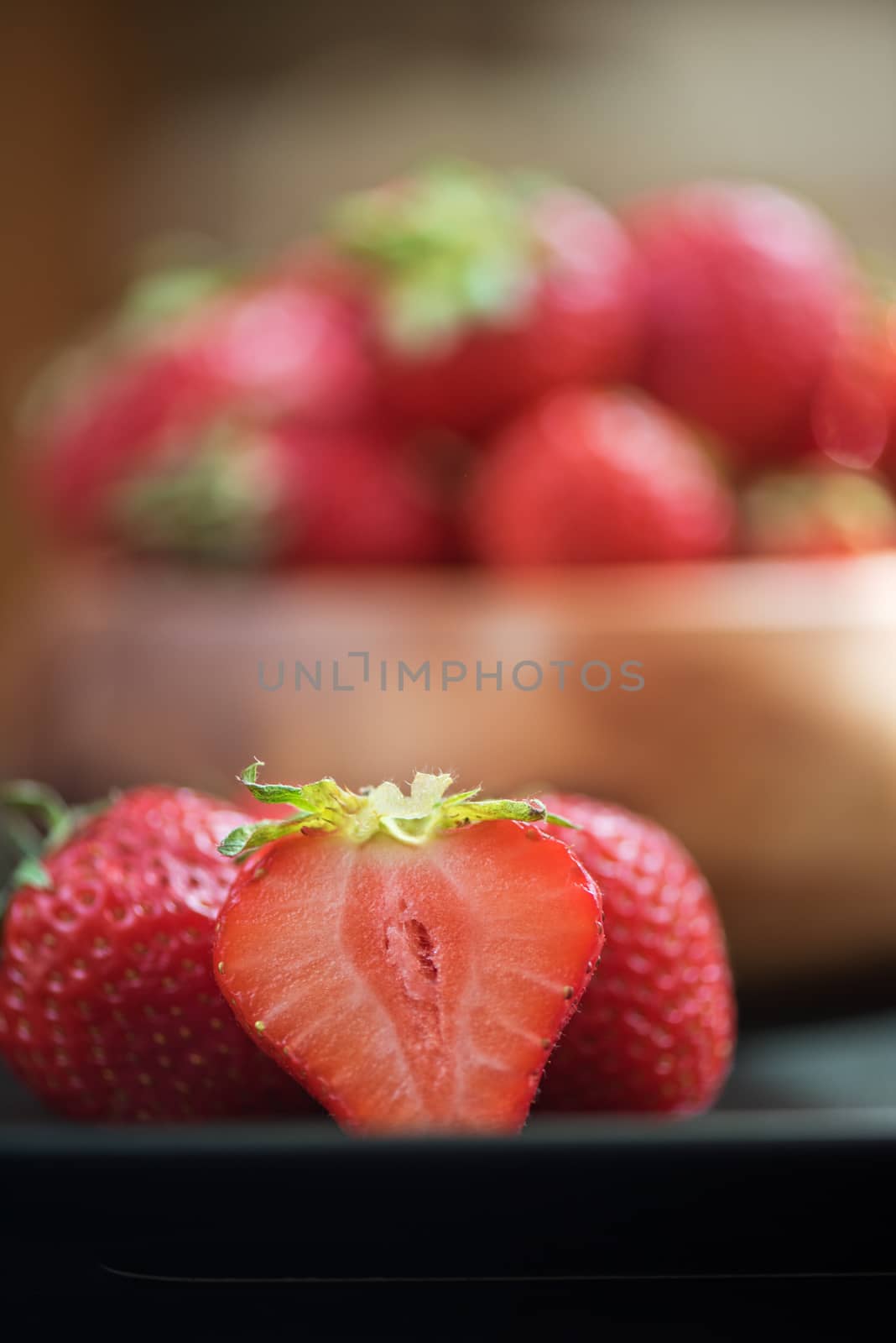 Fresh ripe strawberry in a glass
