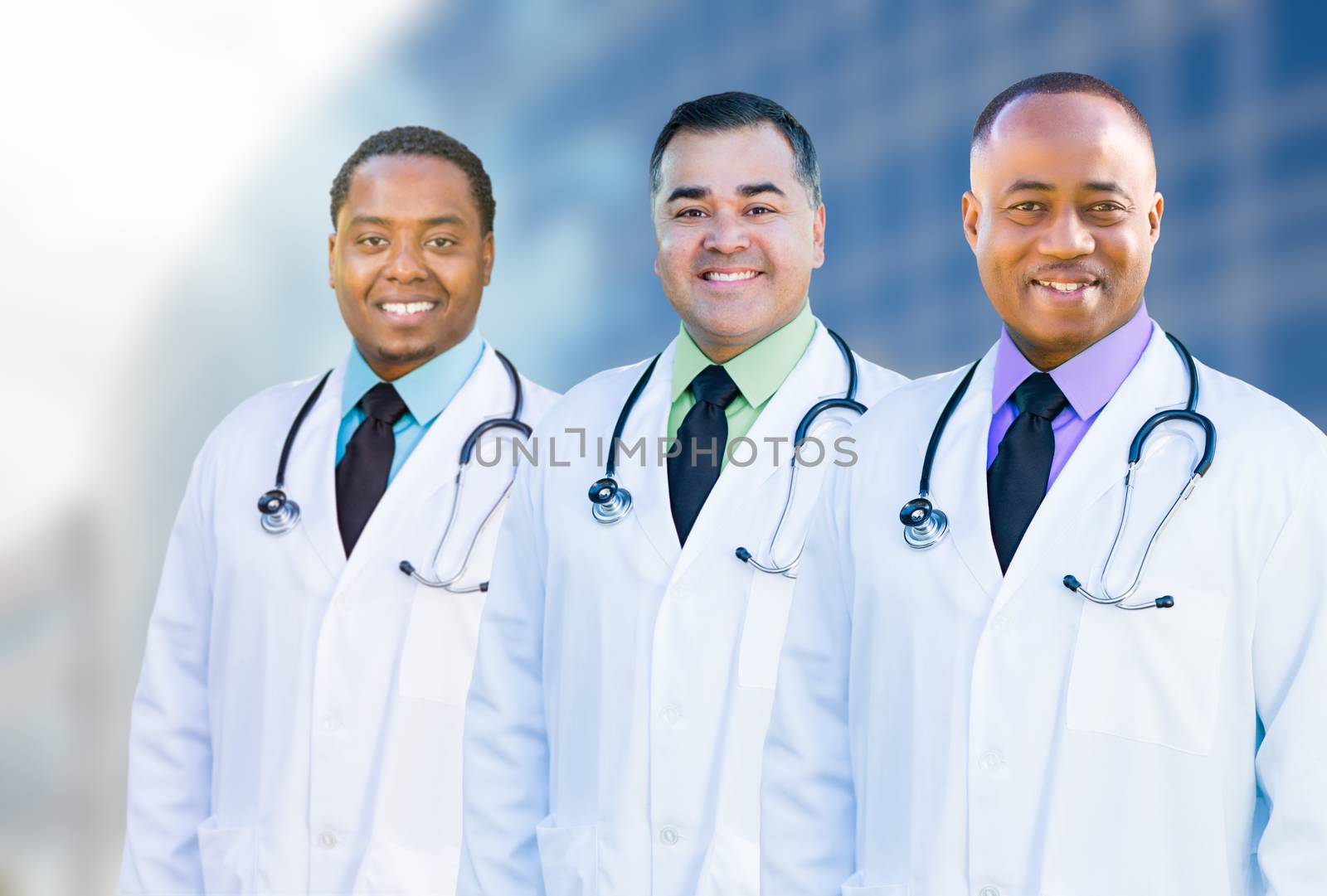 African American and Hispanic Male Doctors Outside of Hospital B by Feverpitched