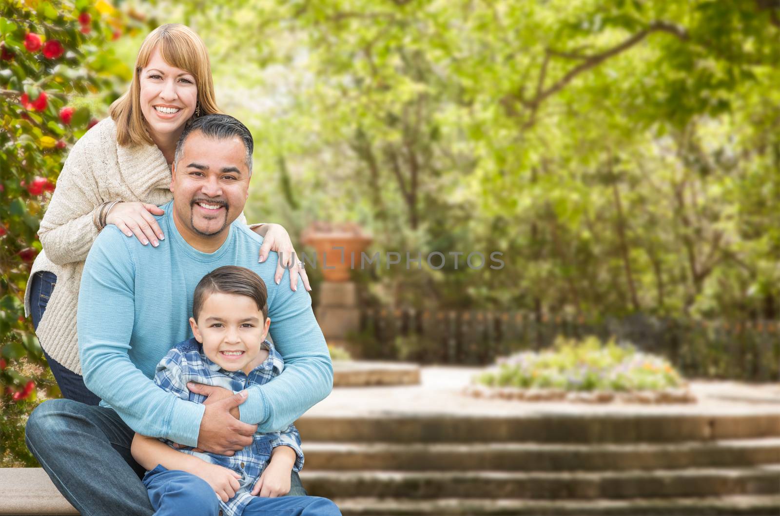 Mixed Race Hispanic and Caucasian Family Portrait at the Park by Feverpitched