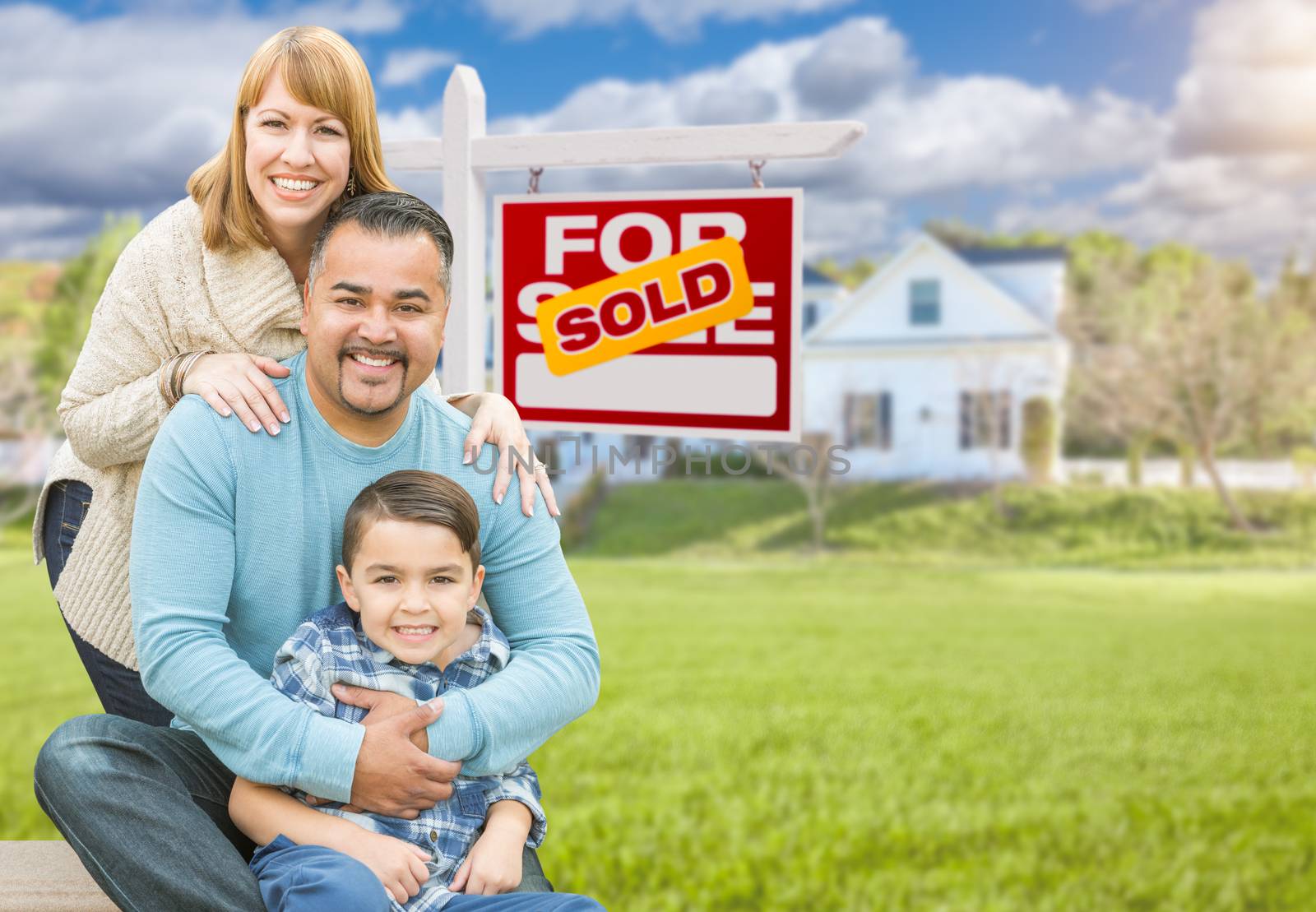 Mixed Race Family In Front of House and Sold For Sale Real Estat by Feverpitched