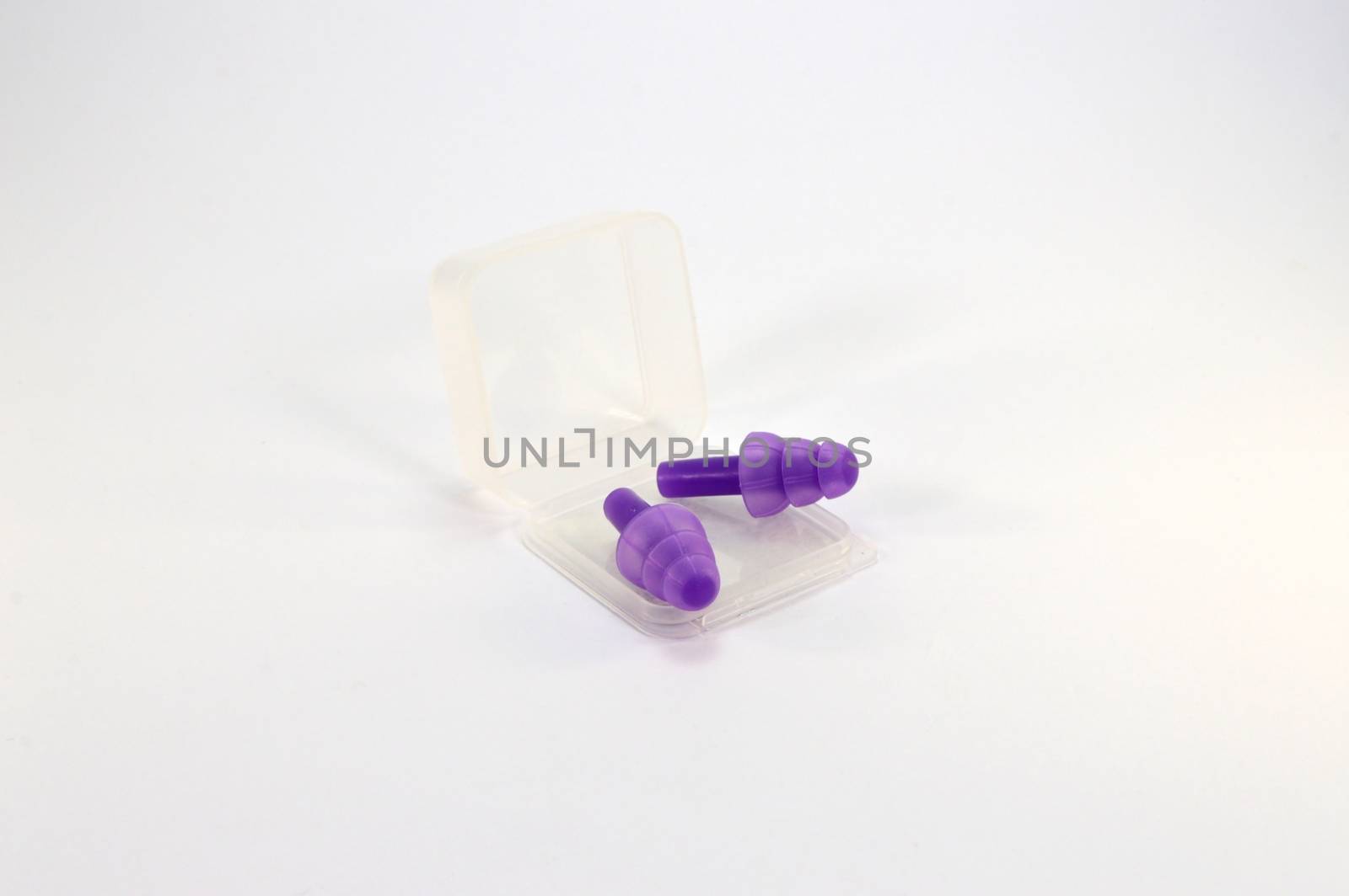 Pair of purple silicone earplugs for ears