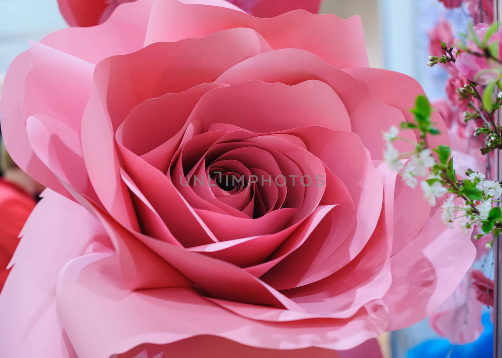 red paper flower. Wedding Decor in photo zone