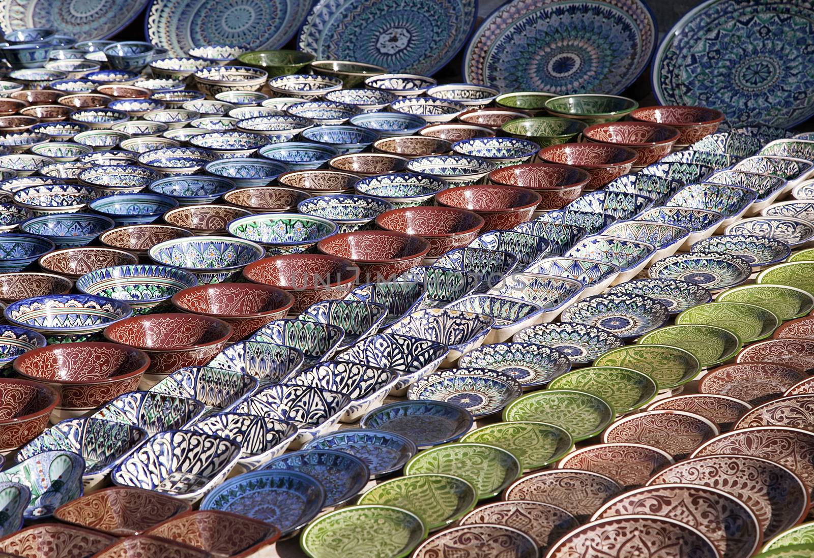 Traditional ceramic dishware in a street market, Uzbekistan