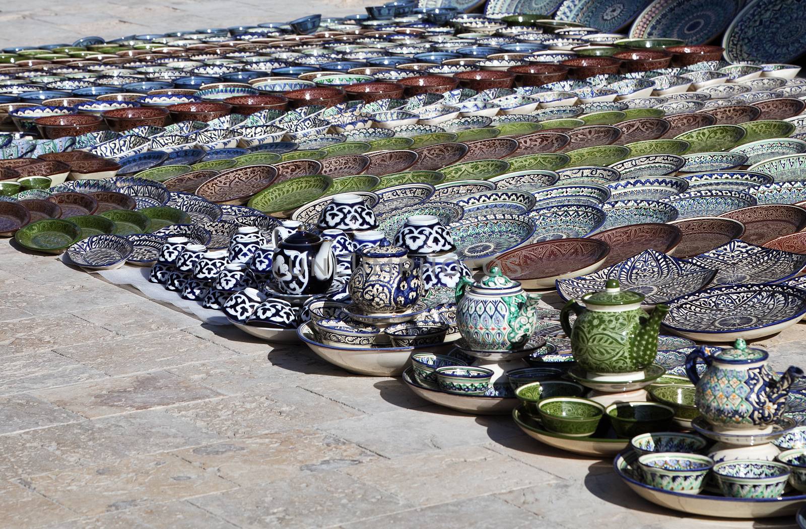 Traditional ceramic dishware in a street market, Uzbekistan