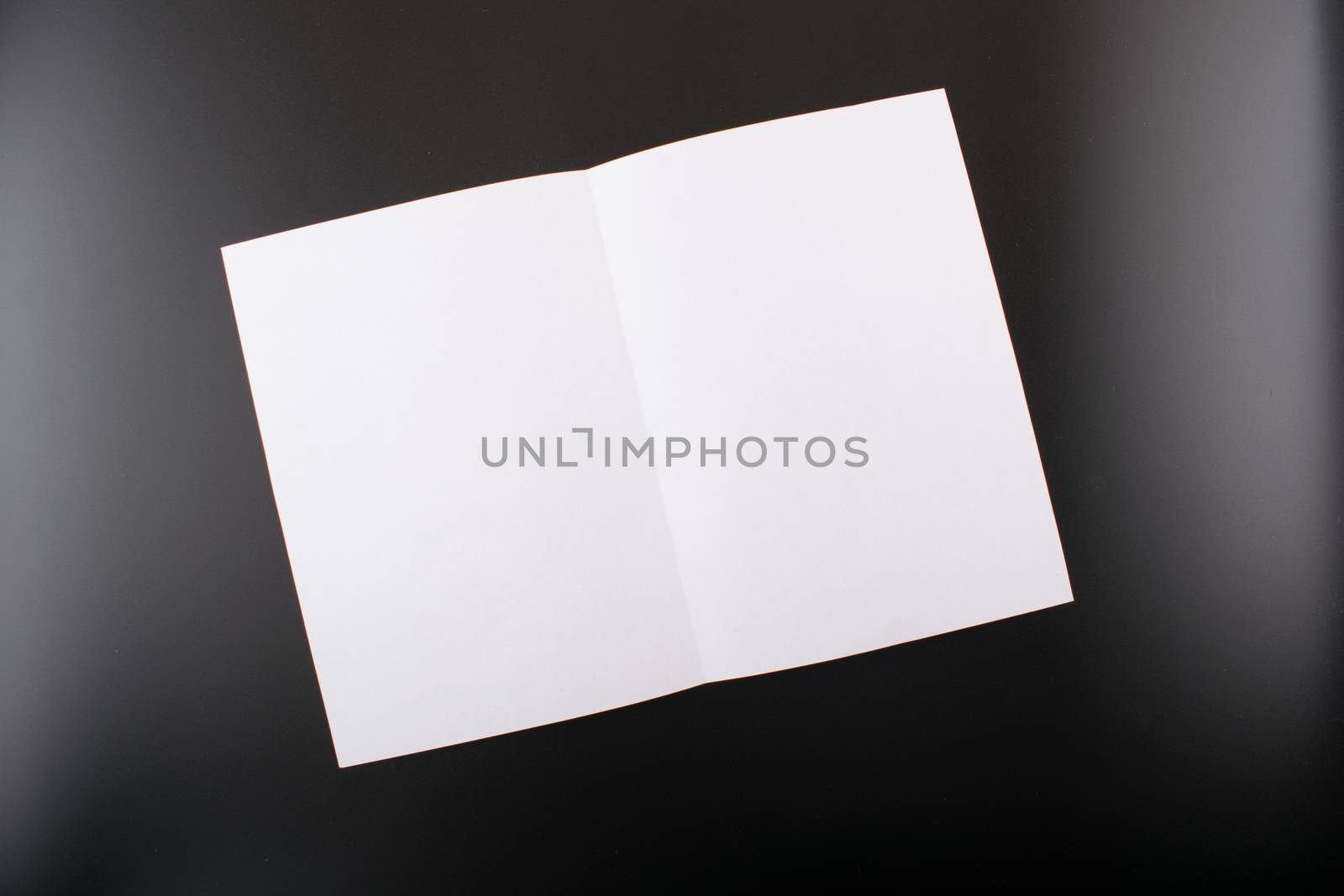 Mock ups on the black background. Templates blank paper by Kazimirko