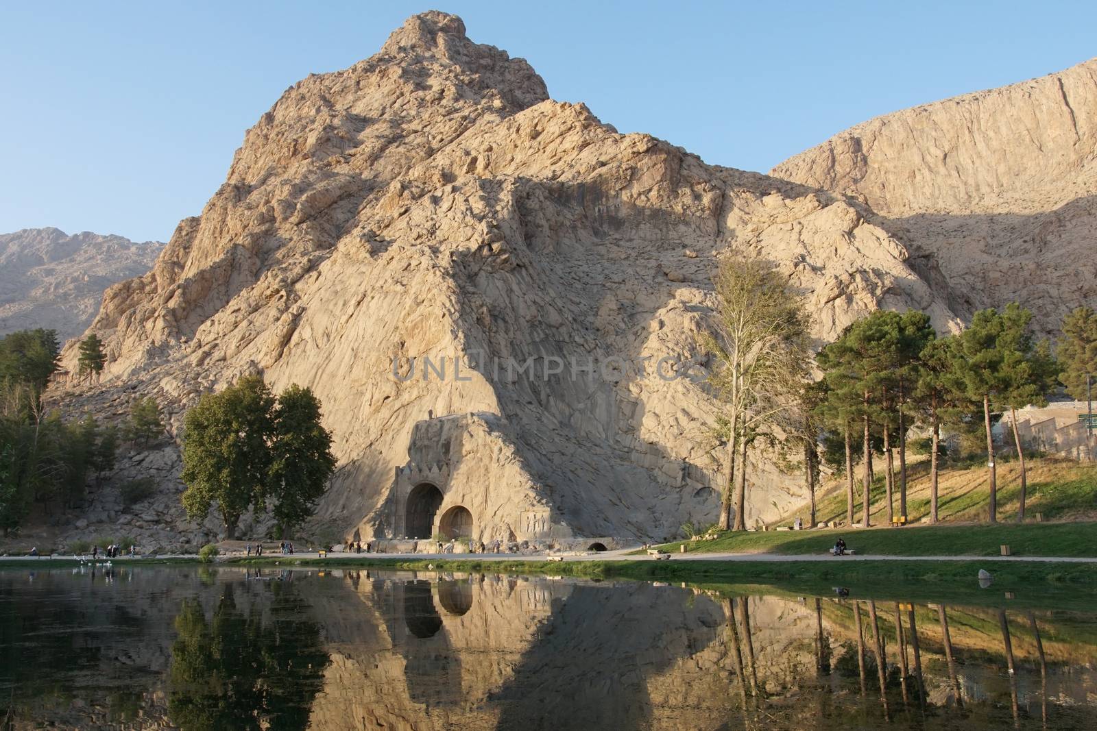 KERMANSHAH, IRAN - OCTOBER 3, 2016: Caves Taq-e Bostan on sundown, historical site of Kermanshah on October 3, 2016 in Iran, Asia