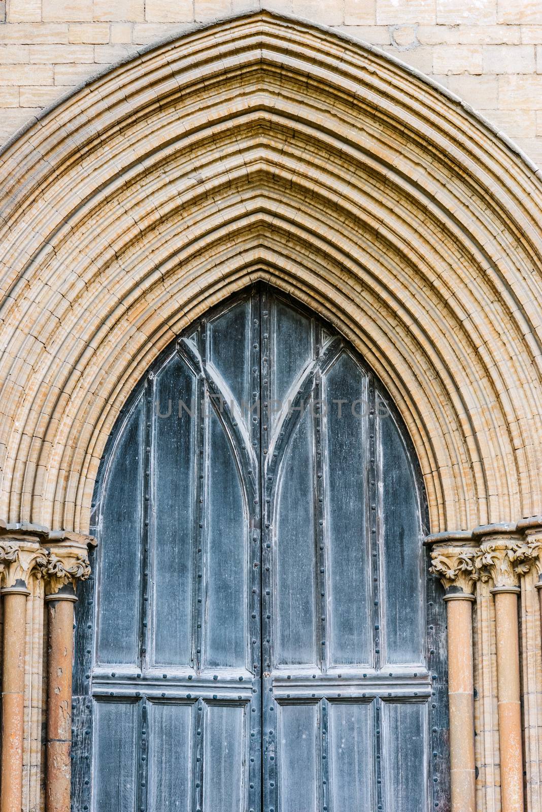 Peterborough Cathedral front wooden gate detail entrance outdoors by Altinosmanaj