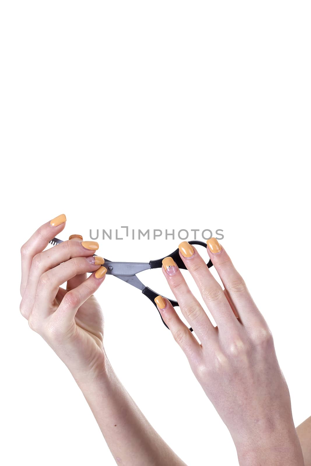 Scissors in hand isolated on white background