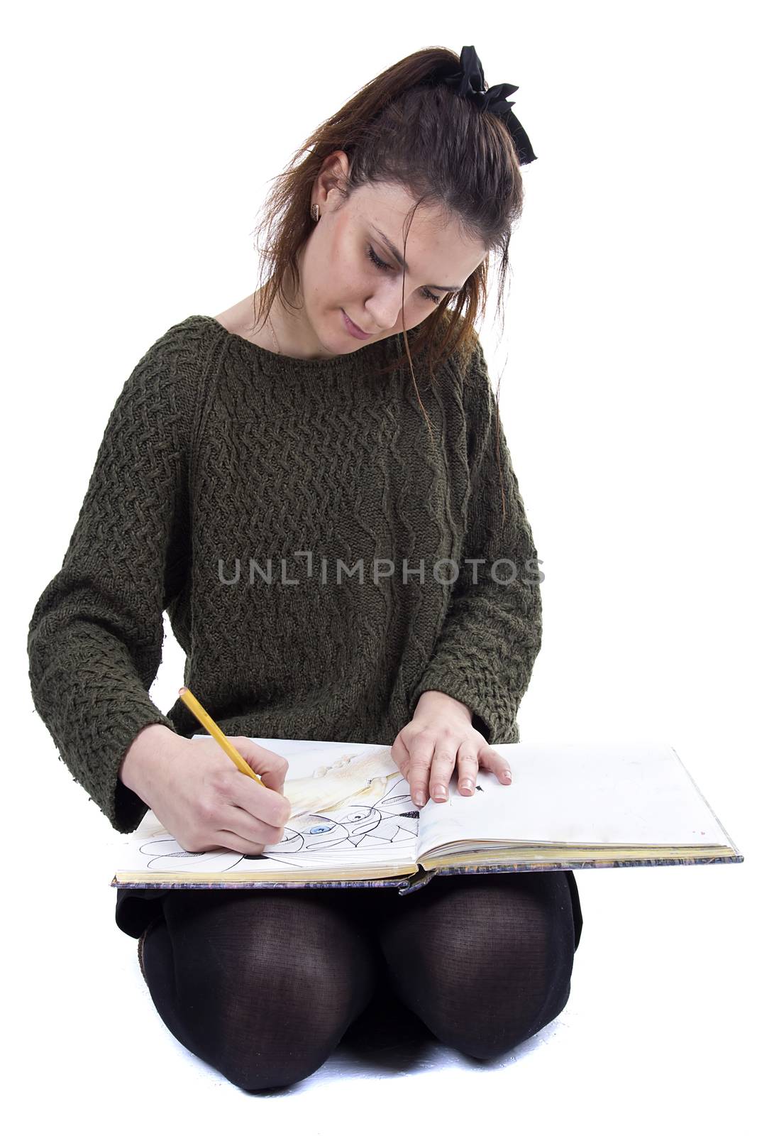 Young girl artist drawing pencils on white background
