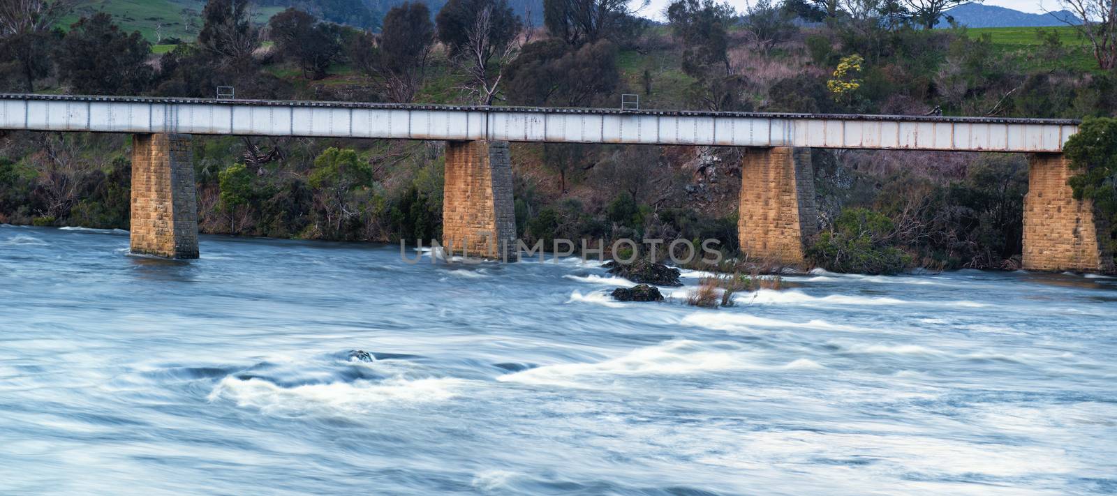 Country bridge and river in Tasmania by artistrobd