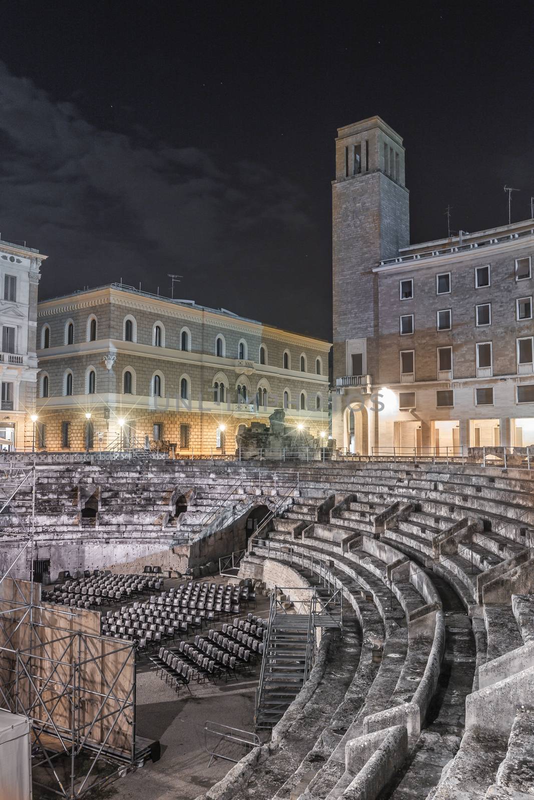 Street view of Roman Amphiteatre in Sant Oronzo square in Lecce, Italy. Built in the 2nd century, this theatre was able to seat more than 25,000 people