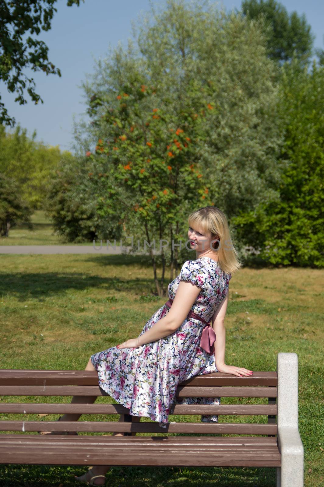 Expectant mother in the Park by kromeshnik