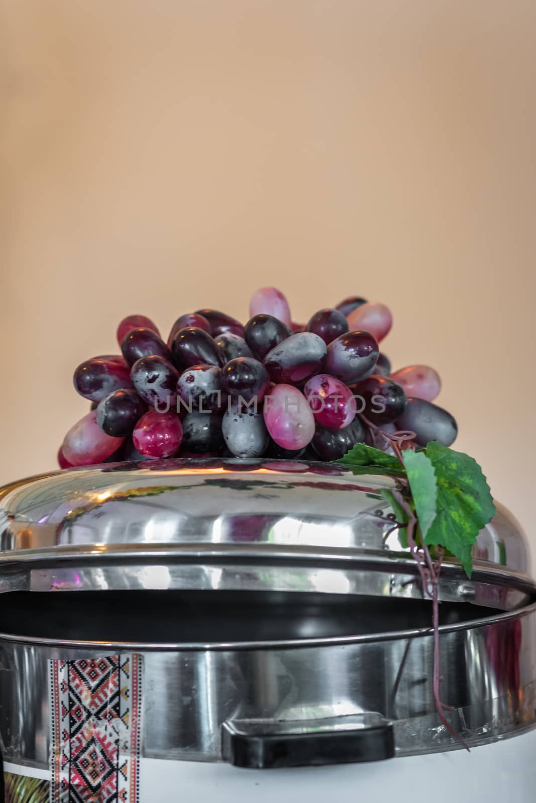 purple red grapes on the iron Pan