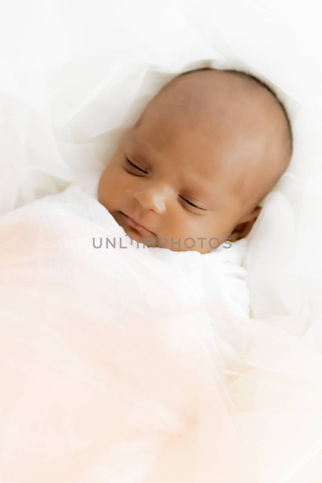 Three weeks old baby sleeping on white blanket cute infant newborn lying down close up shot eyes closed by Altinosmanaj
