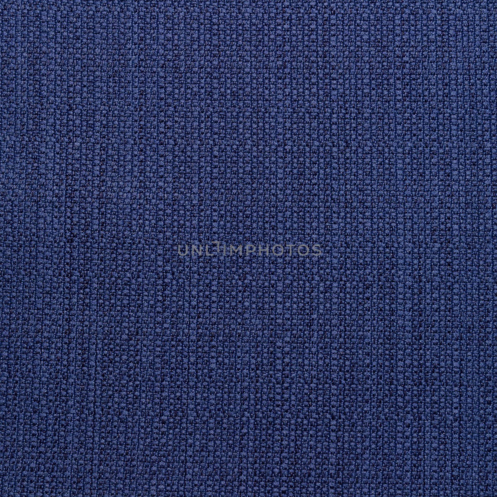 Rustic canvas fabric texture in blue color. Square shape