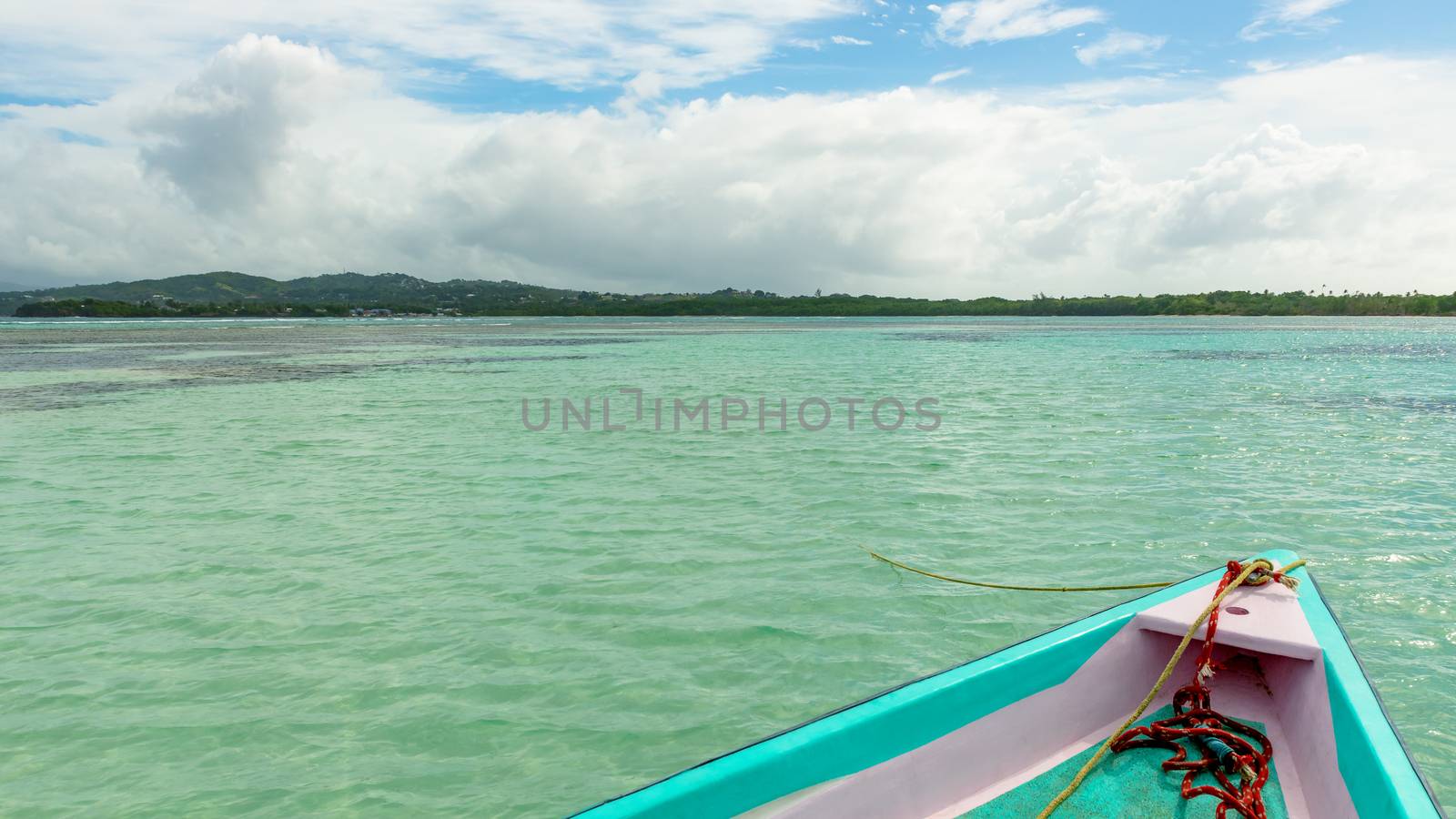 Boat front view of No mans land and nylon pool in Tobago Caribbean Sea by Altinosmanaj