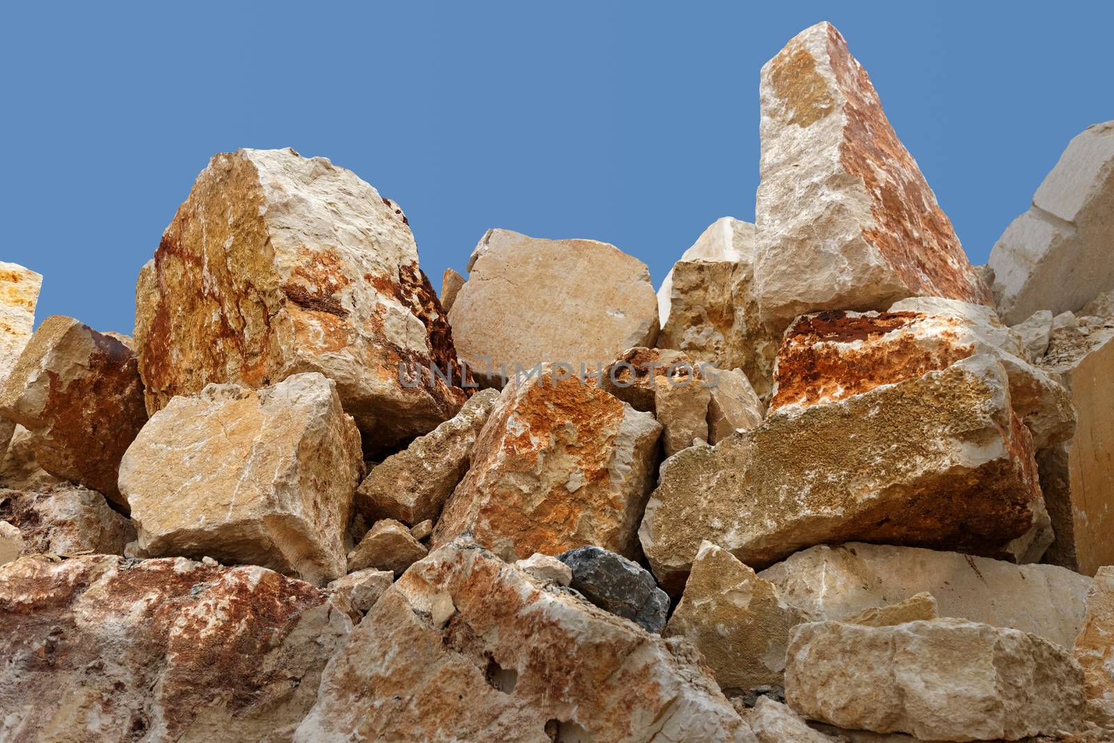 a pile of big rocks against sky