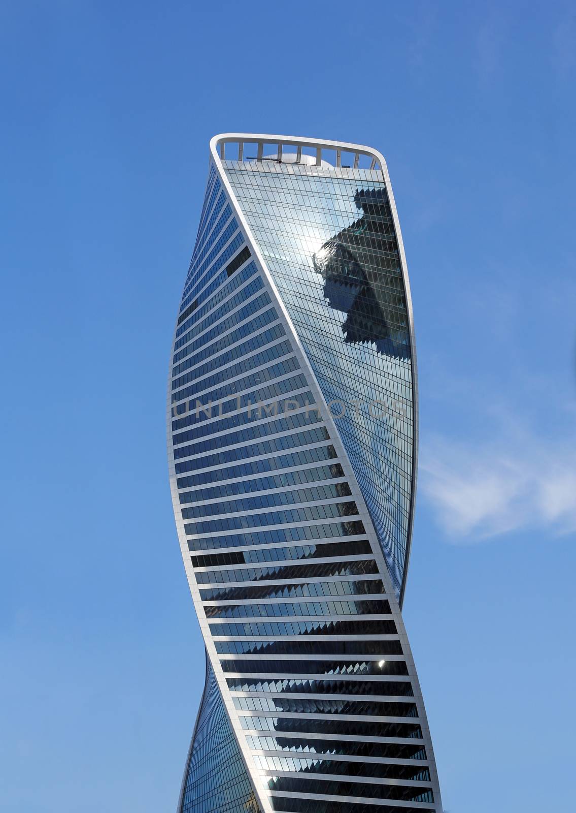 Modern buildings of glass and steel skyscrapers against the sky.