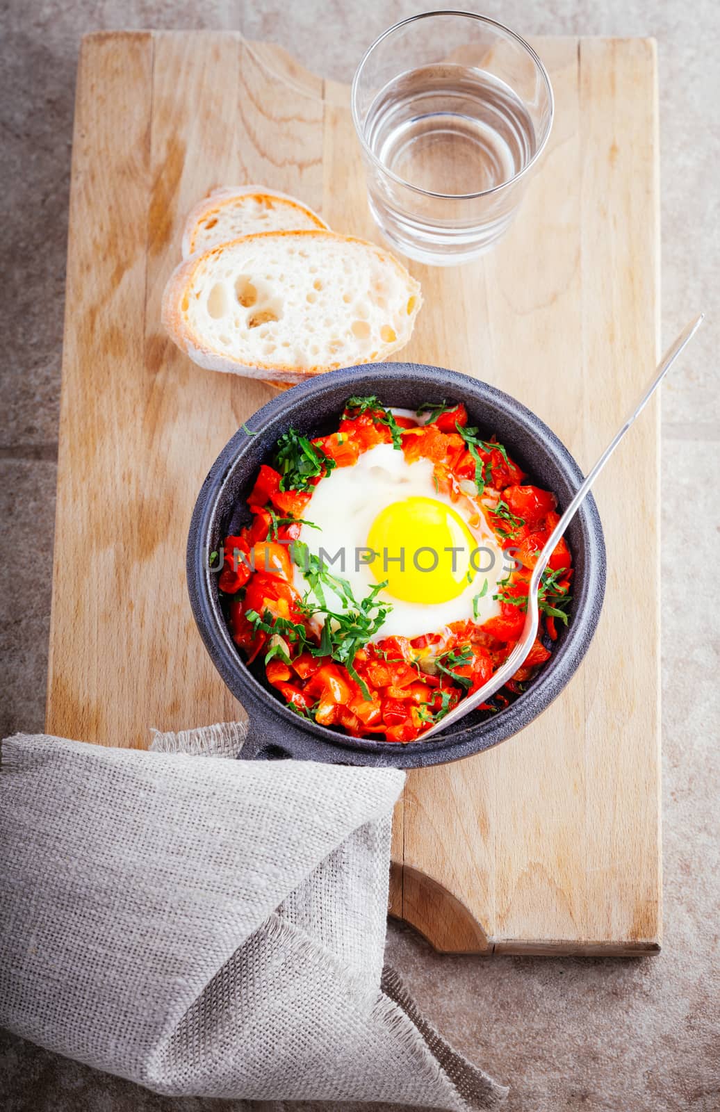 Traditional middle eastern dish of shakshuka in a pan. by supercat67