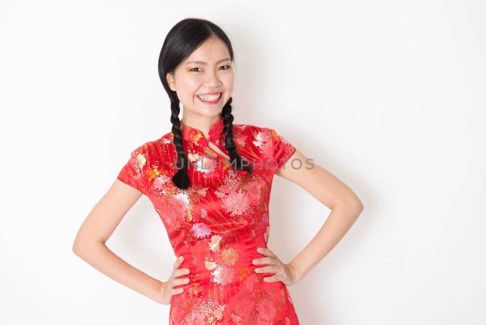 Oriental girl in red qipao smiling by szefei