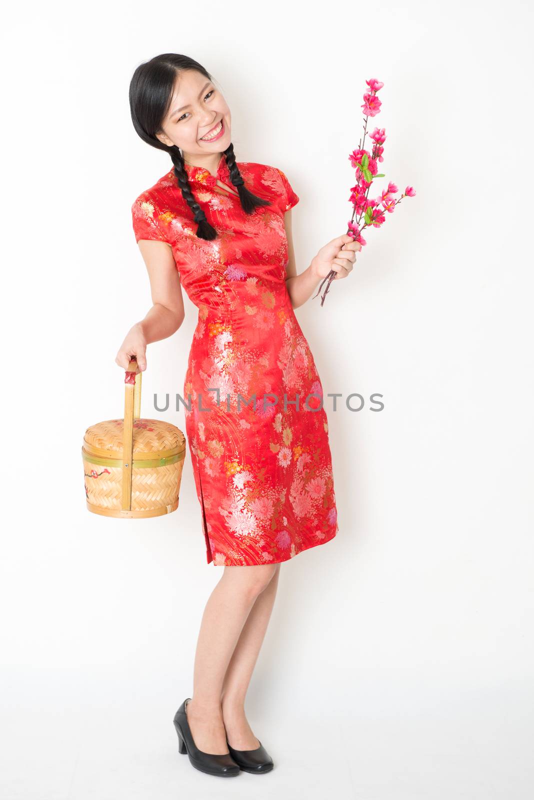 Oriental female in red qipao holding gift basket by szefei