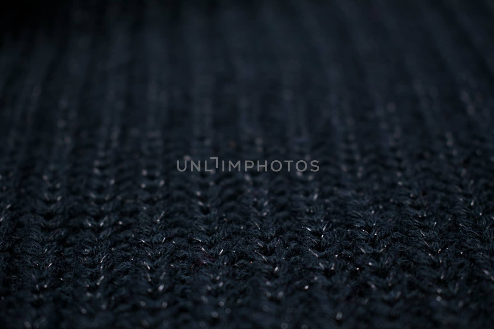 A black sweater close up textile product