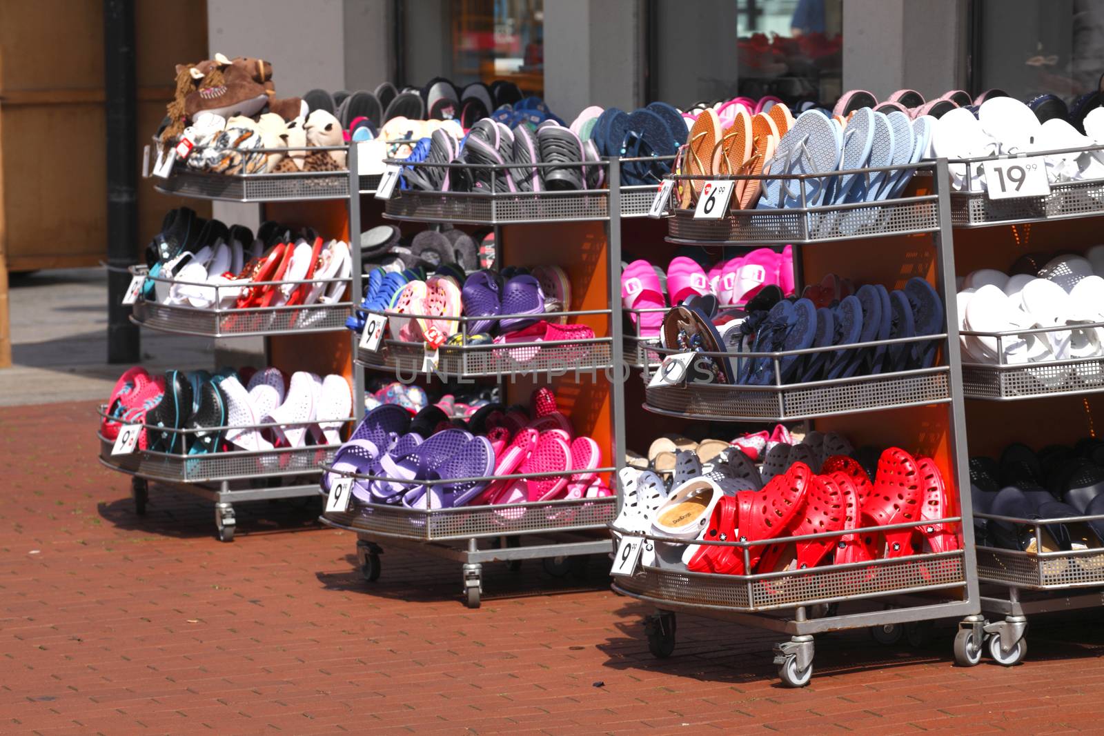 Summer Shoes on a Rack from a  Shoe shop