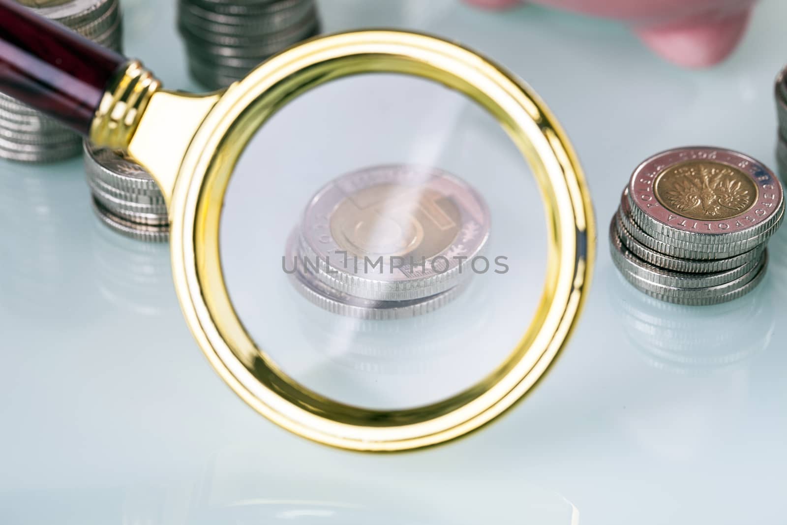 Financial concept with piggy bank, pile of money on white background