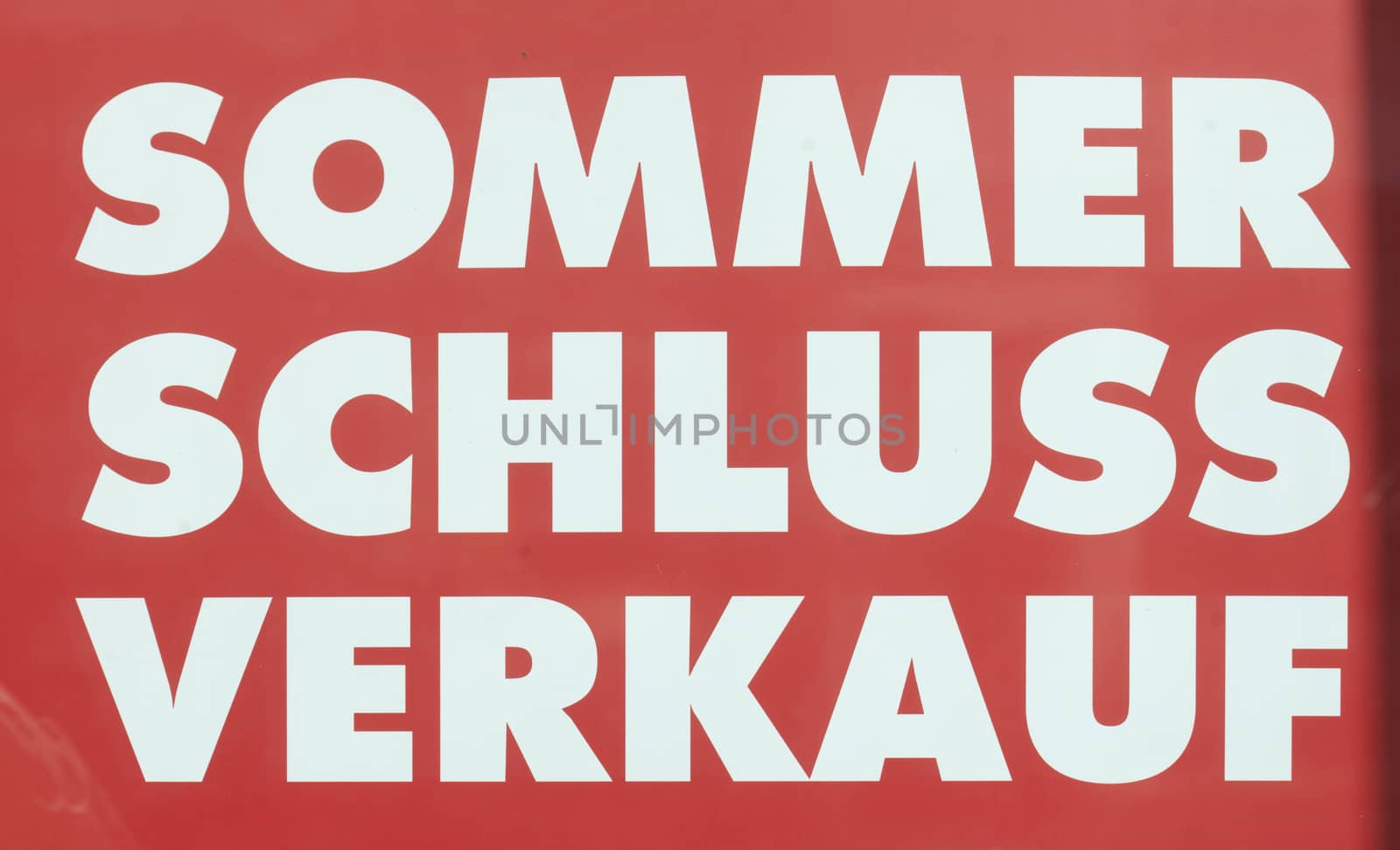 Red Sale Sign "Sommerschlussverkauf", a price reducing Sale at the end of the Summer in Germany