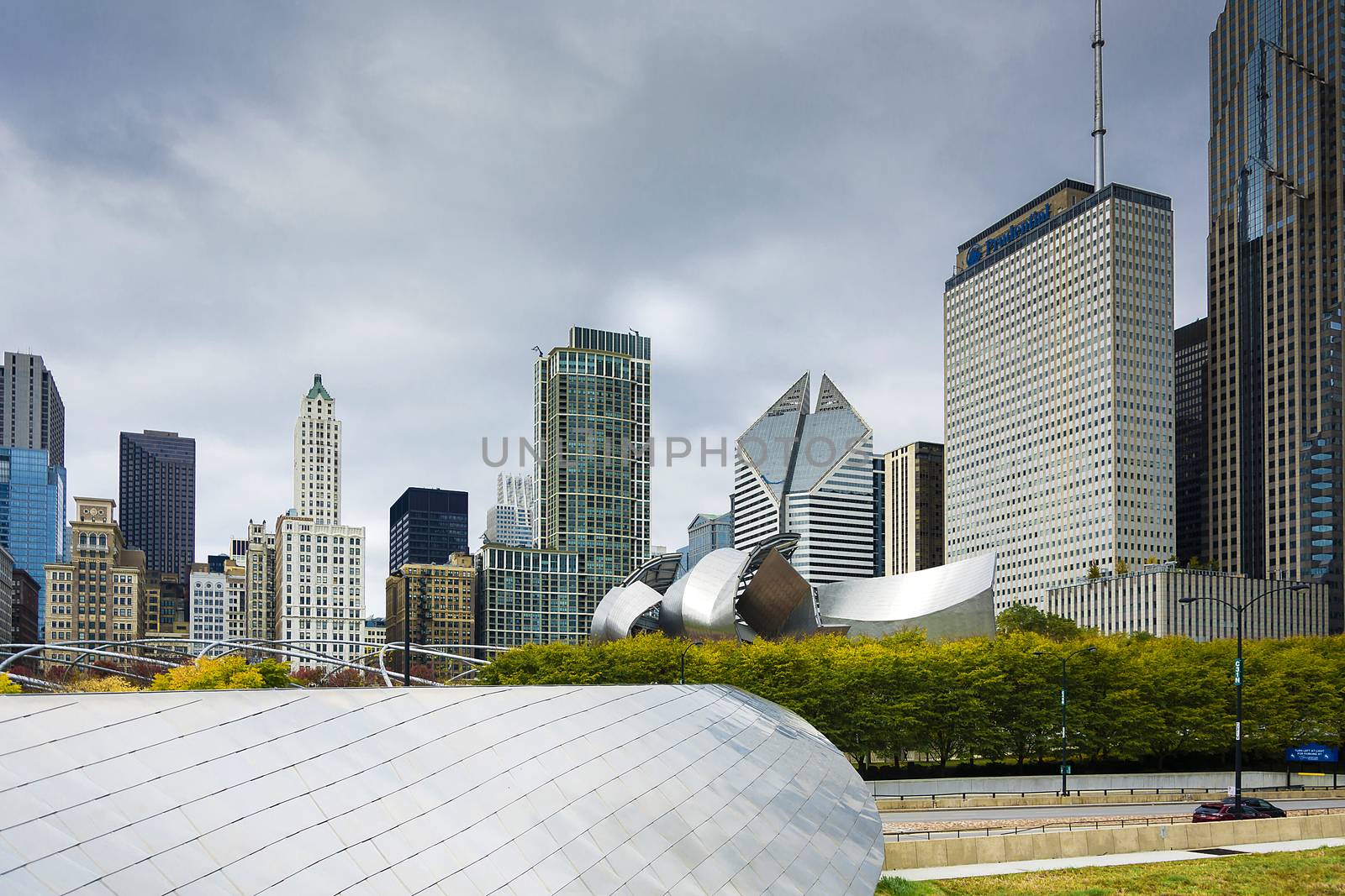 Chicago, IL, USA, october 27, 2016: The BP Bridge in Millennium Park, Chicago, Illinois, USA Chicago skyline in the background sunny winter day