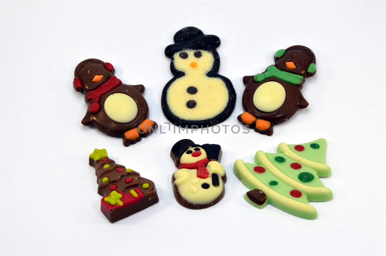 Six Belgian chocolates representing Christmas figurines