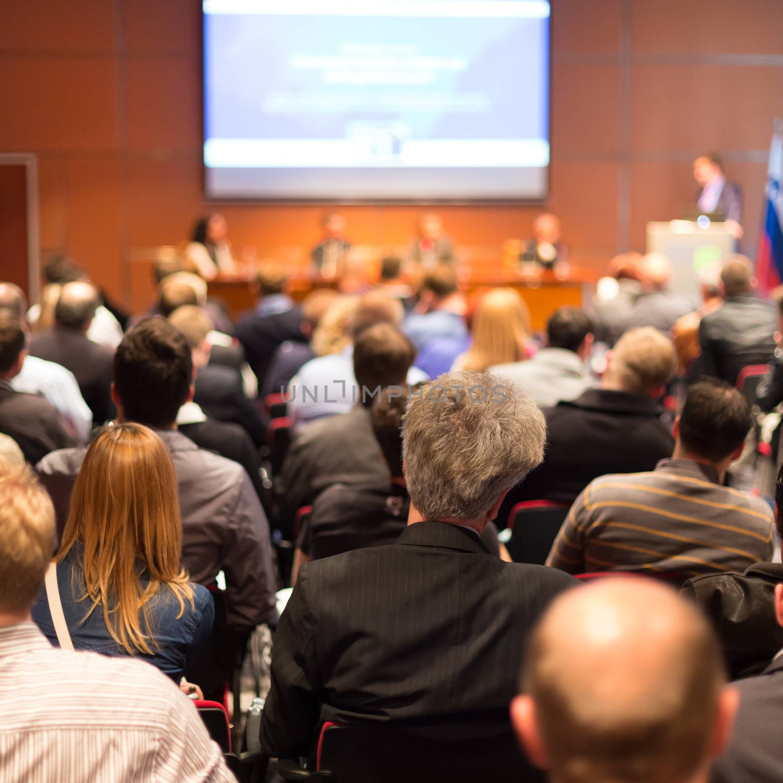 Audience at the conference hall. by kasto