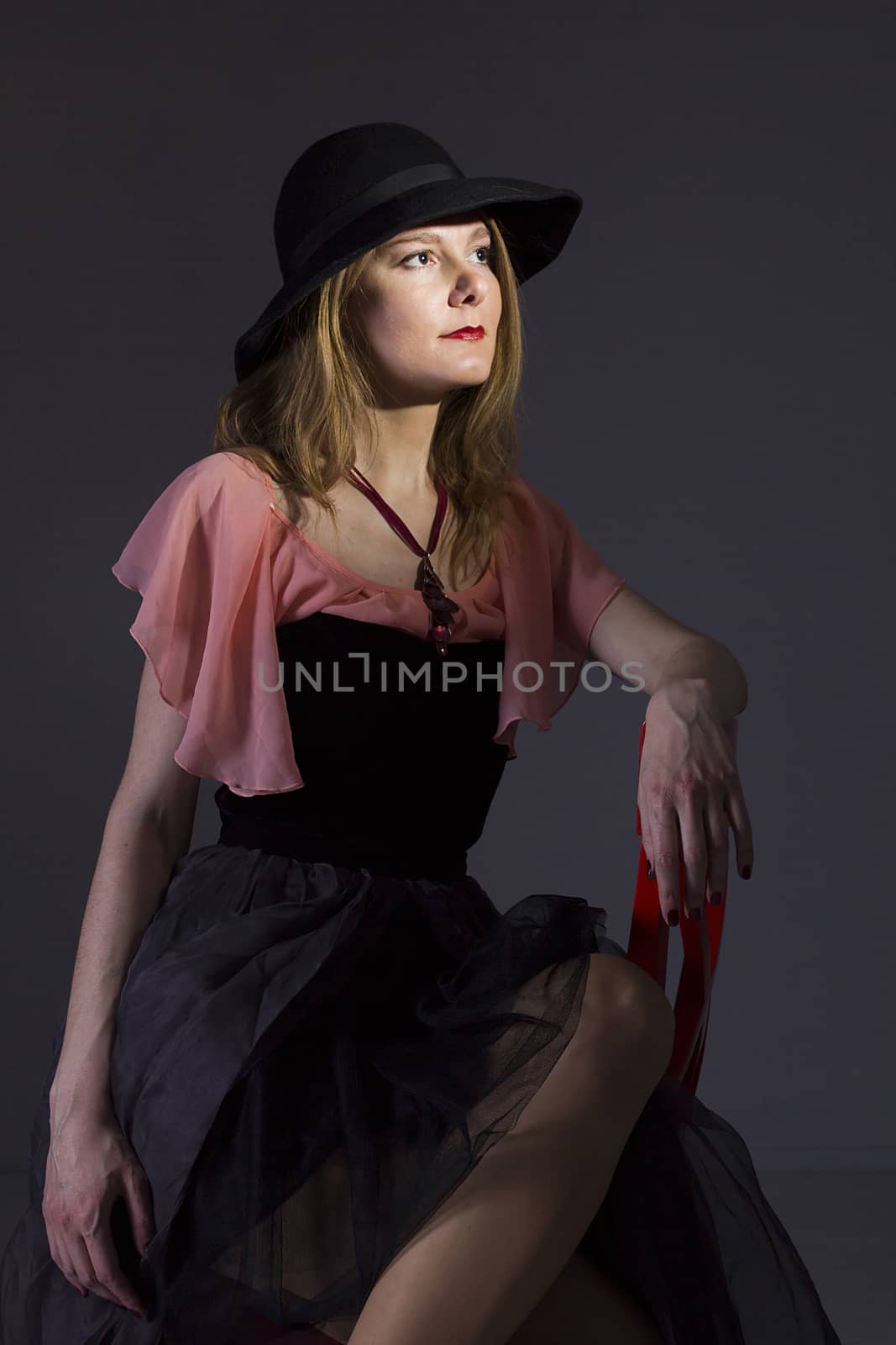 Portrait of a young woman in a hat by VIPDesignUSA