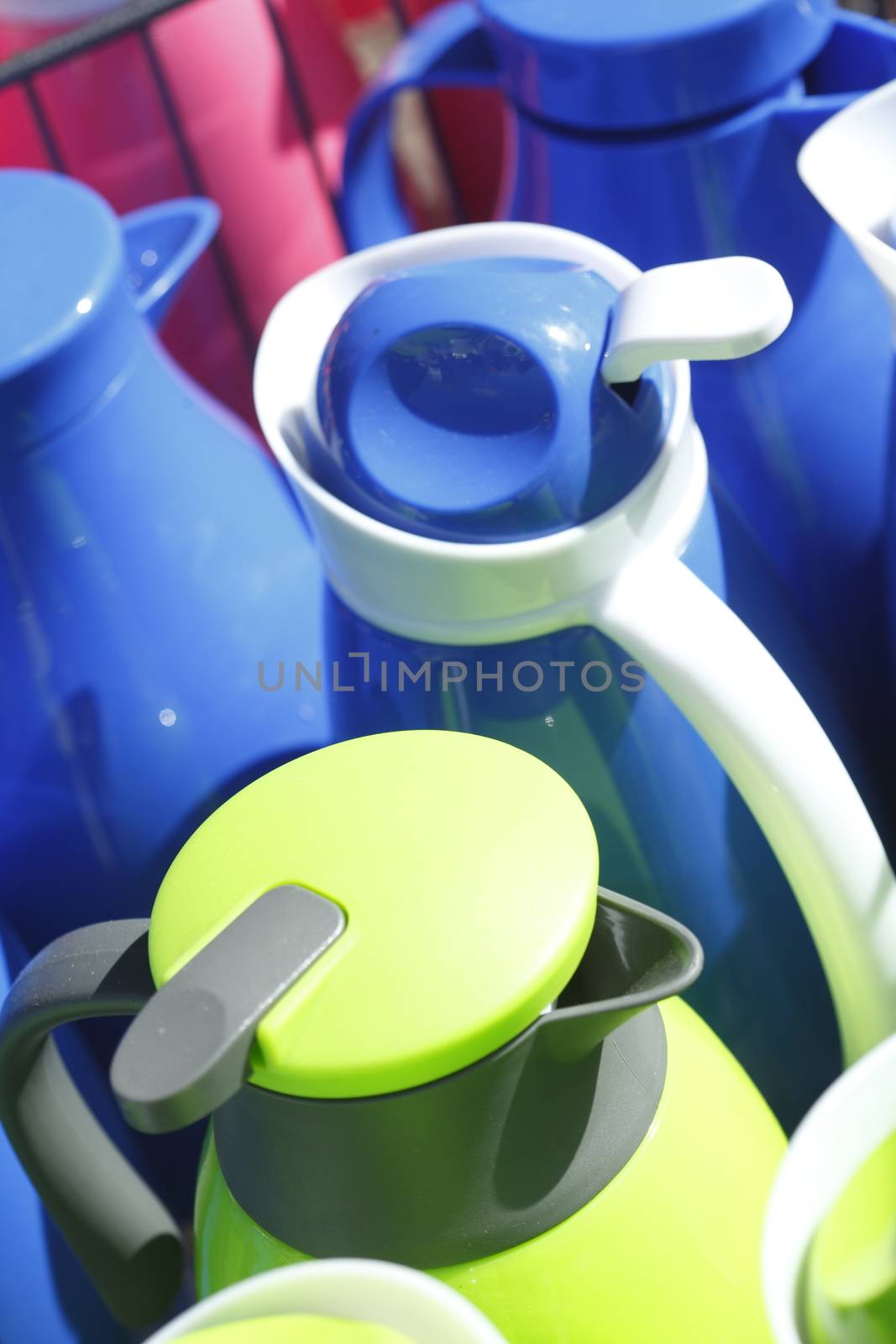 Colorful Coffee Cans in a Shopping Street