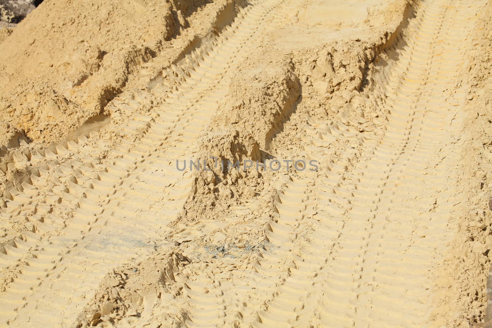 Exclavator Tracks in the  Sand